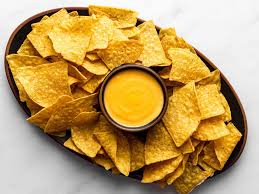 nacho chips with cheese dip